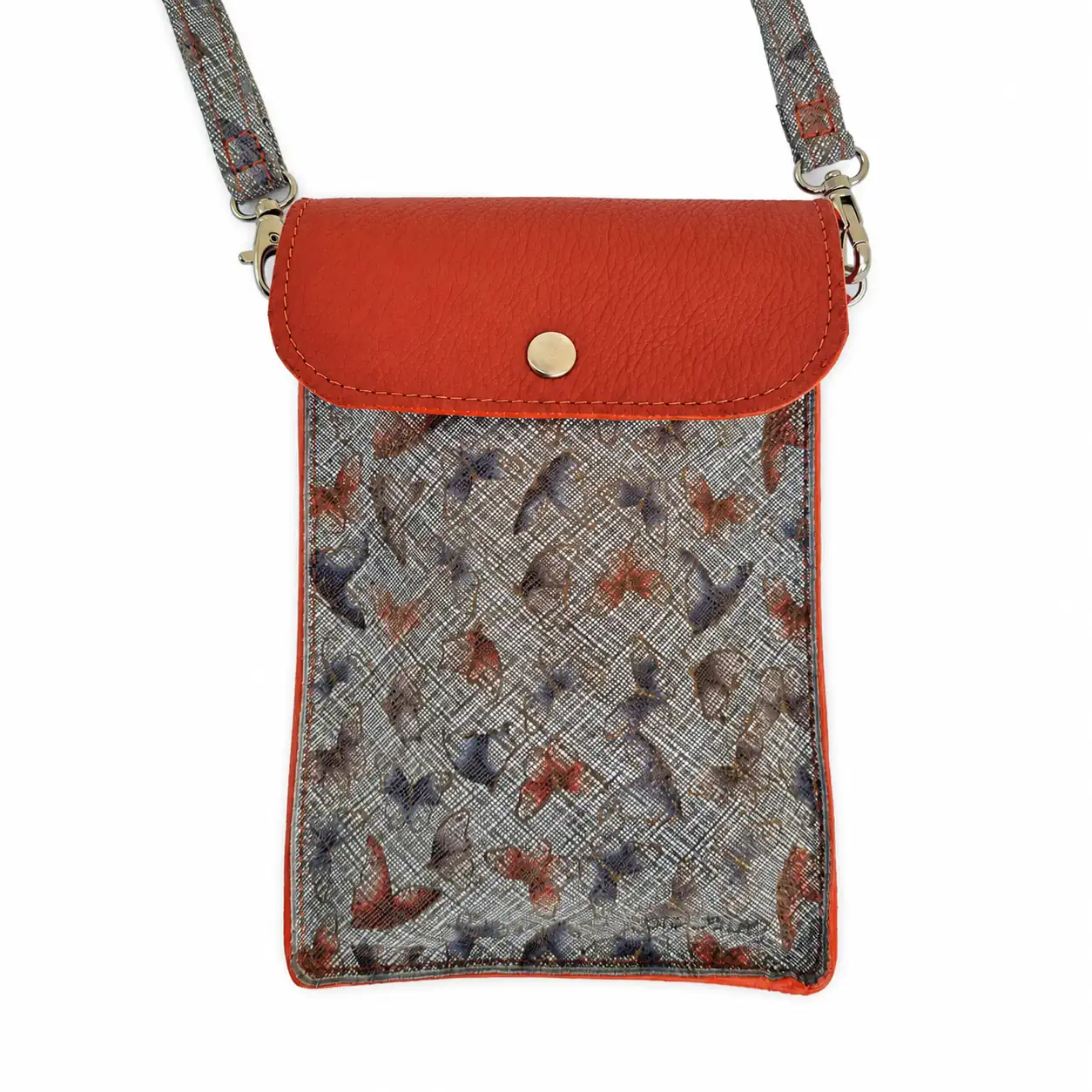 Pochette artisanale en cuir orange brique motif papillons, portée en bandoulière, fabrication française. (Face)