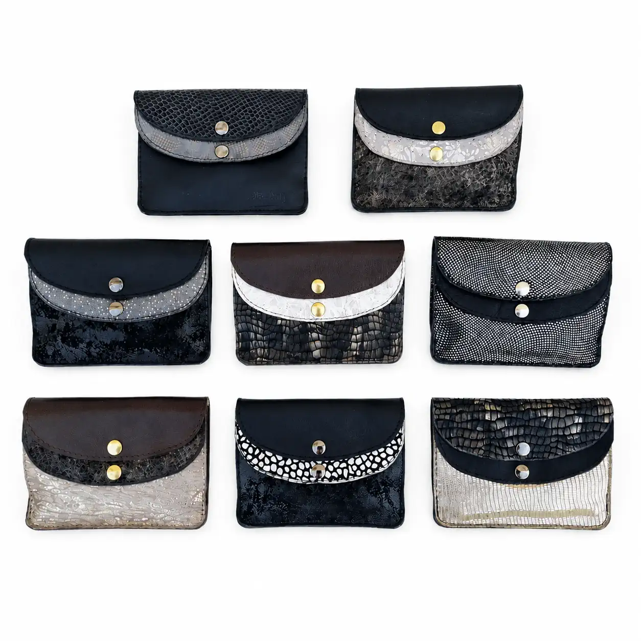 Collection de portefeuilles femme en cuir artisanaux noir, gris et argenté, fabrication française
